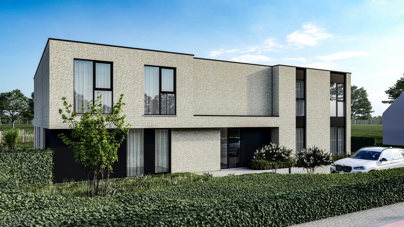 Twee aaneengesloten woningen in lichte baksteen met donkere ramen, aan een groene straatkant